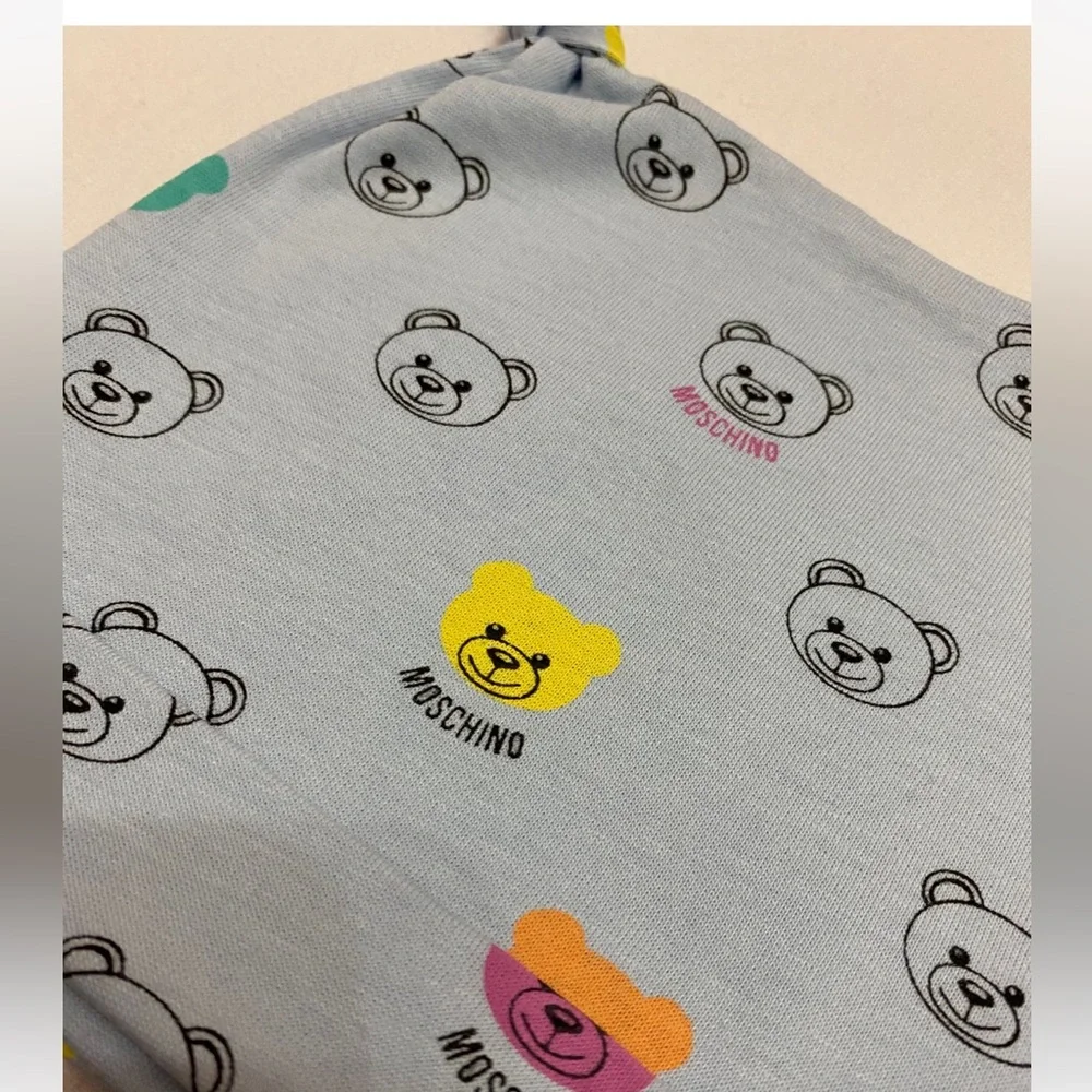 Matching set bib and hat baby Moschino